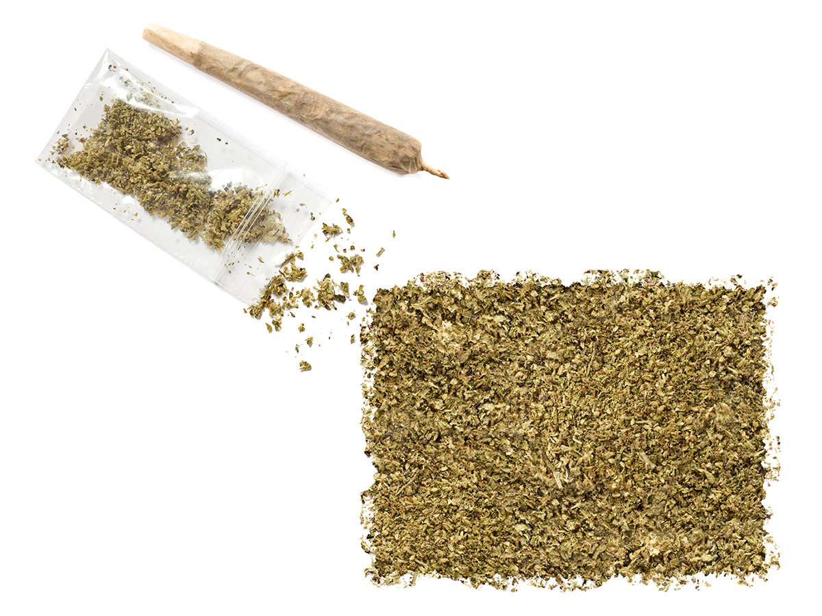State of Colorado made out of marijuana trip with a joint above it