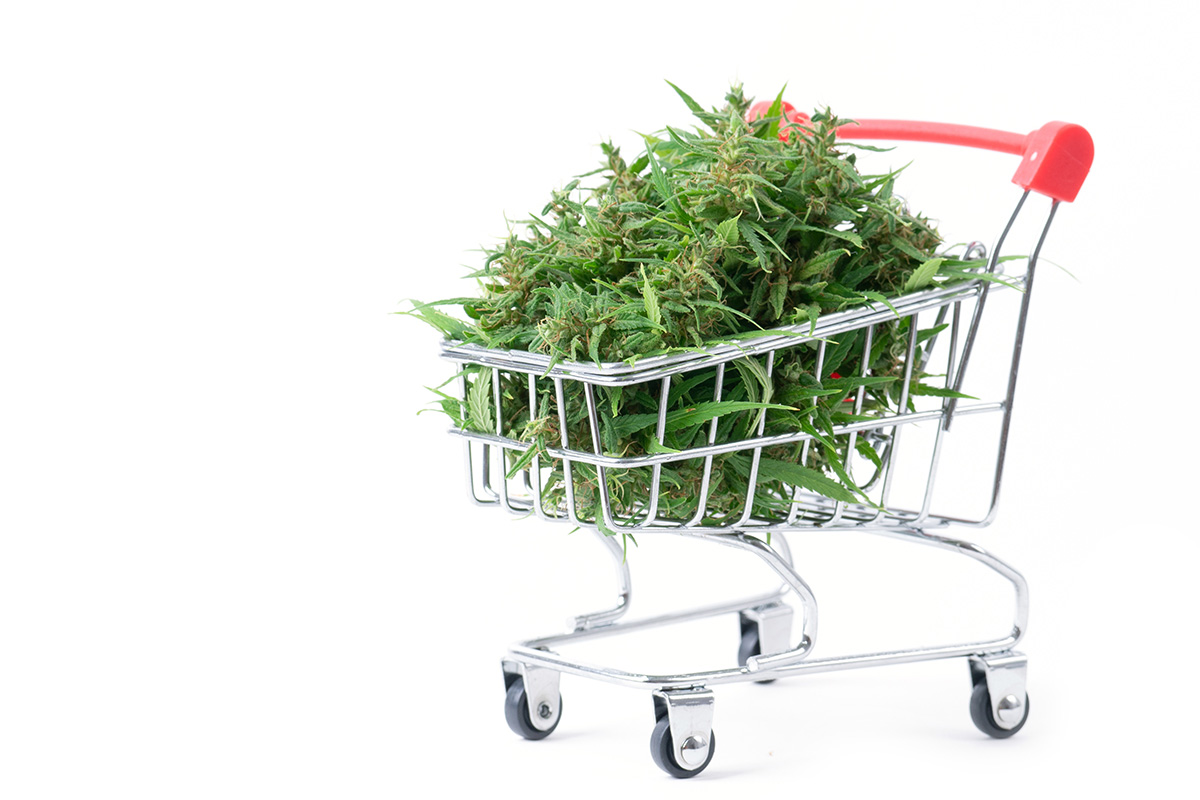 Shopping cart filled with raw cannabis flower