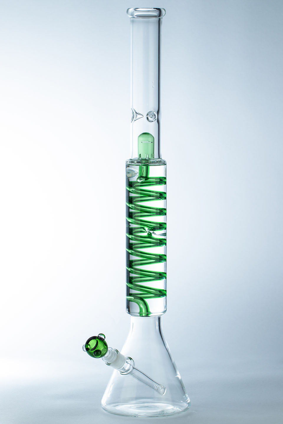 Glass bong with a green glycerin coil