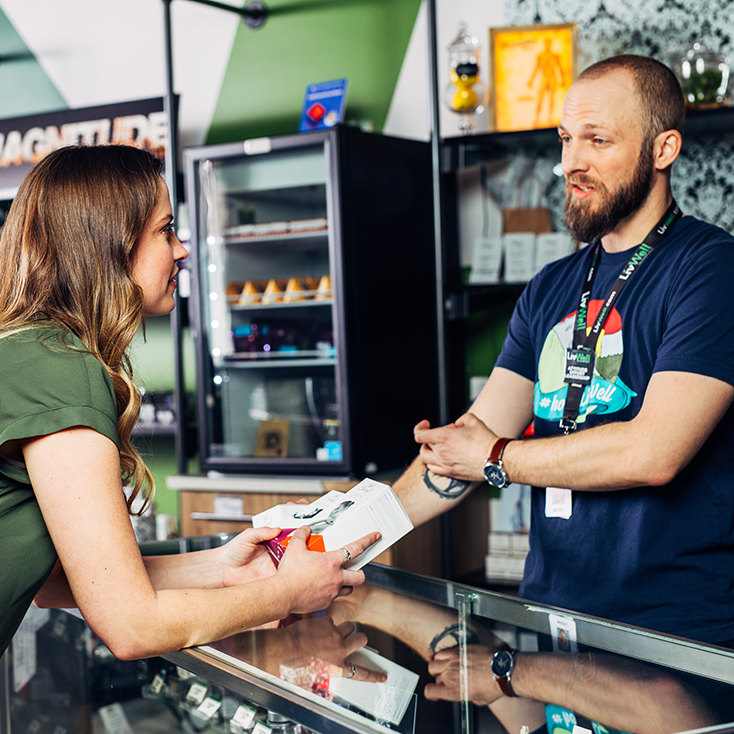 woman customer with budtender